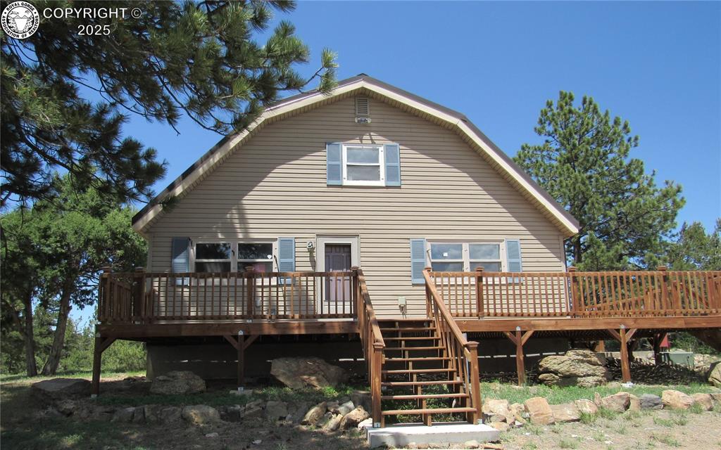 855 Ernest Avenue Westcliffe, Colorado Escape to this serene, secluded retreat at the end of a quiet road, offering the perfect combination of privacy and modern living. This charming 2-bedroom, 1.75-bathroom home sits on just over 10 acres of picturesque land, providing ample space for outdoor activities and simply enjoying nature. This raised ranch-style home boasts 1,964 sq. ft. of living space, with a spacious upper-level primary suite featuring a full bath and stunning views of the surrounding acreage and mountains. The interior features an updated eat-in kitchen with modern finishes, making meal prep a breeze. The home’s layout is both functional and cozy perfect for year round living or a summer retreat! Step out onto the deck wrapping the front and side of this home to enjoy sunrise and sunset! Multiple outbuildings are ideal for small animals, chickens or additional storage. Over-sized detached 2-car garage with opener and an attached animal pen and loafing sheds. Whether you’re looking for a quiet retreat or a homestead with room to grow, this home is ideal for those seeking both comfort and seclusion. Enjoy the best of rural living, with great access to nature, yet just a short drive from Westcliffe. Don’t miss this opportunity to own a slice of paradise with endless possibilities!