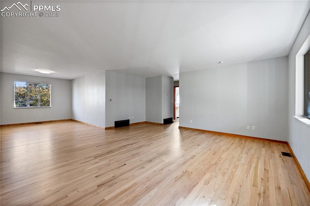 Freshly refinished original hardwoods on the main level!
