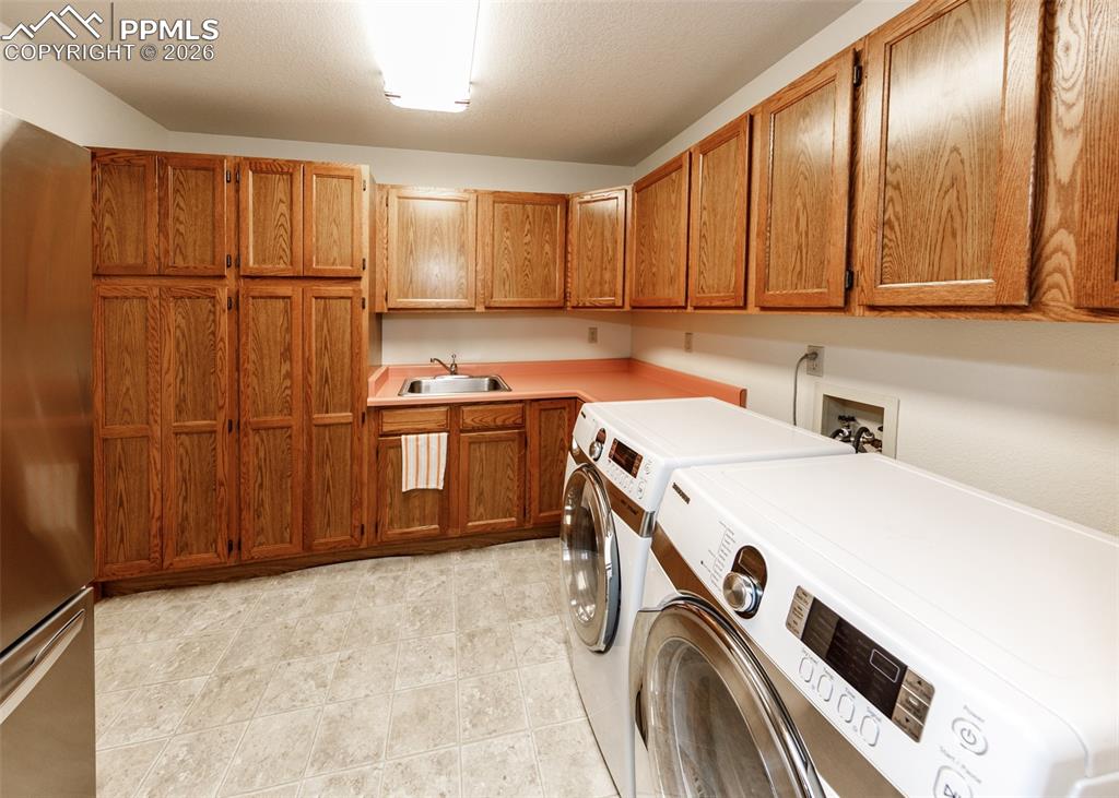 Discover the convenience of our main floor laundry room, a generously sized space designed to effortlessly handle all your laundry requirements.