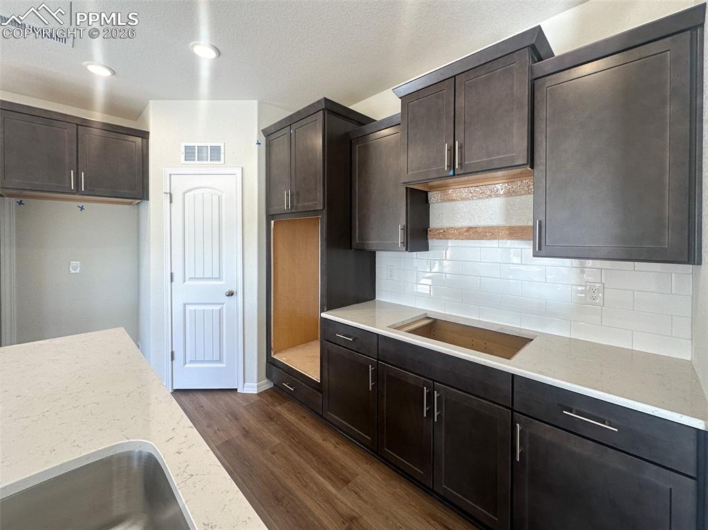 Stainless steel double oven, microwave, gas range top and dishwasher included 