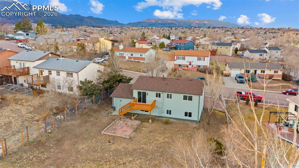 Aerial view of residential area with mountains