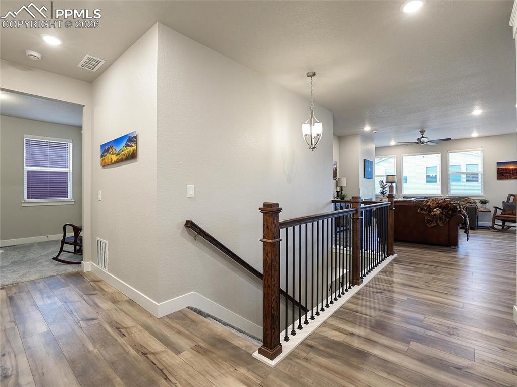 view of office and stairs to basement