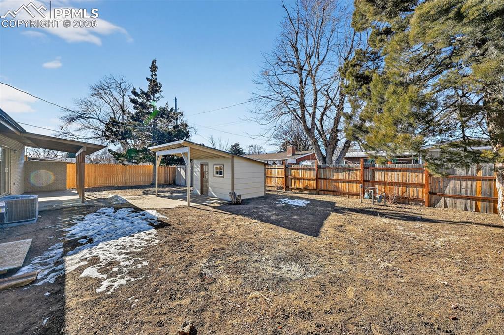 Backyard with storage shed