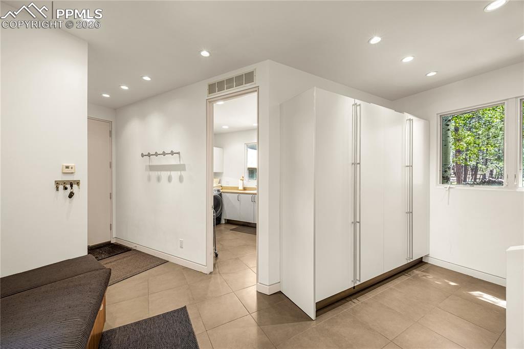 Mudroom connects laundry room to garage