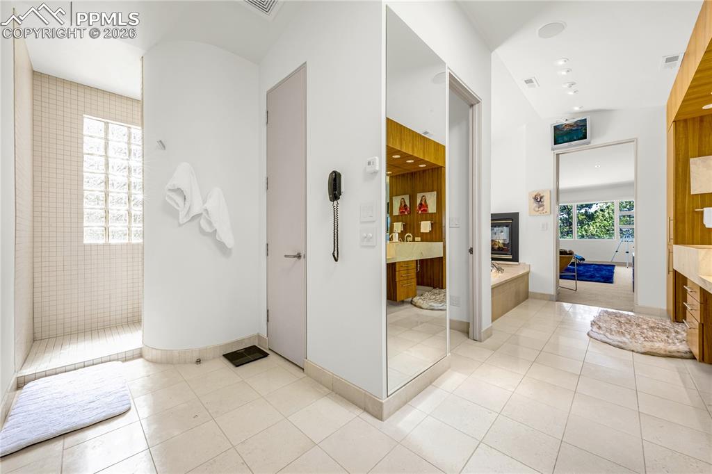 Walk-in primary closet with built-in organization