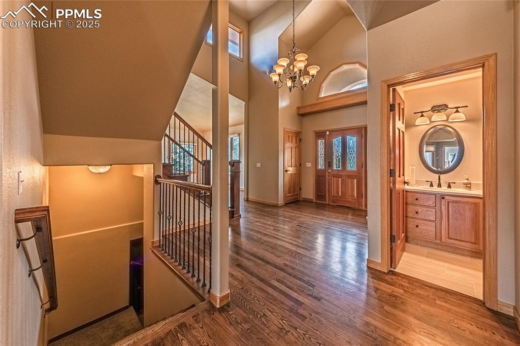 View to front door and entry bath