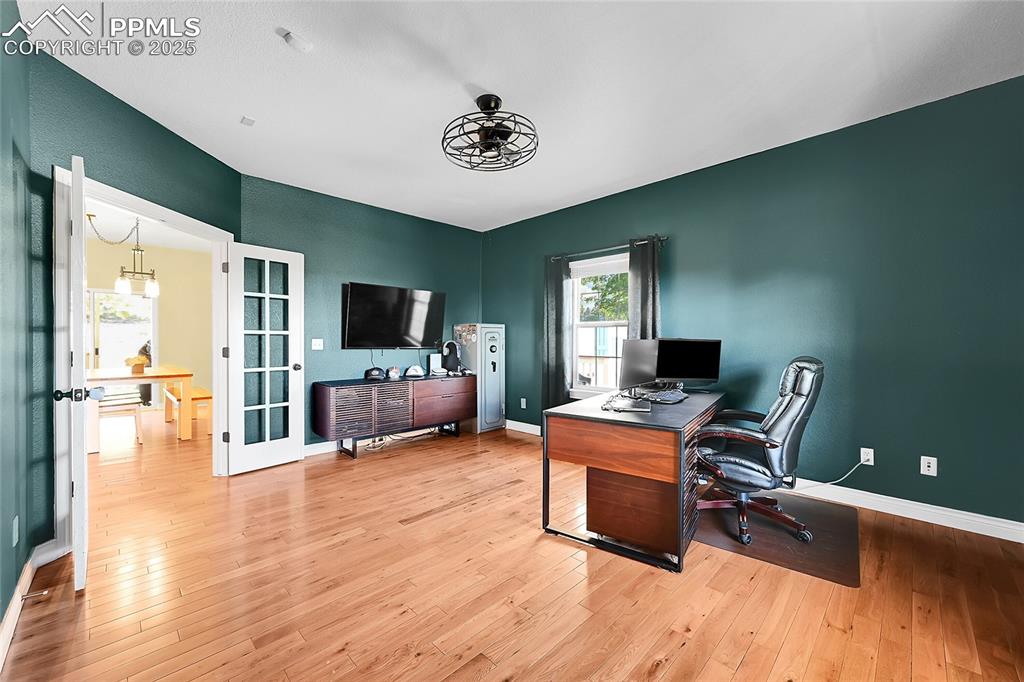 Office featuring paned glass French doors