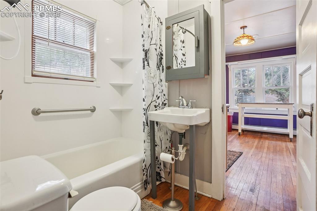 Bathroom off kitchen and bedroom 3