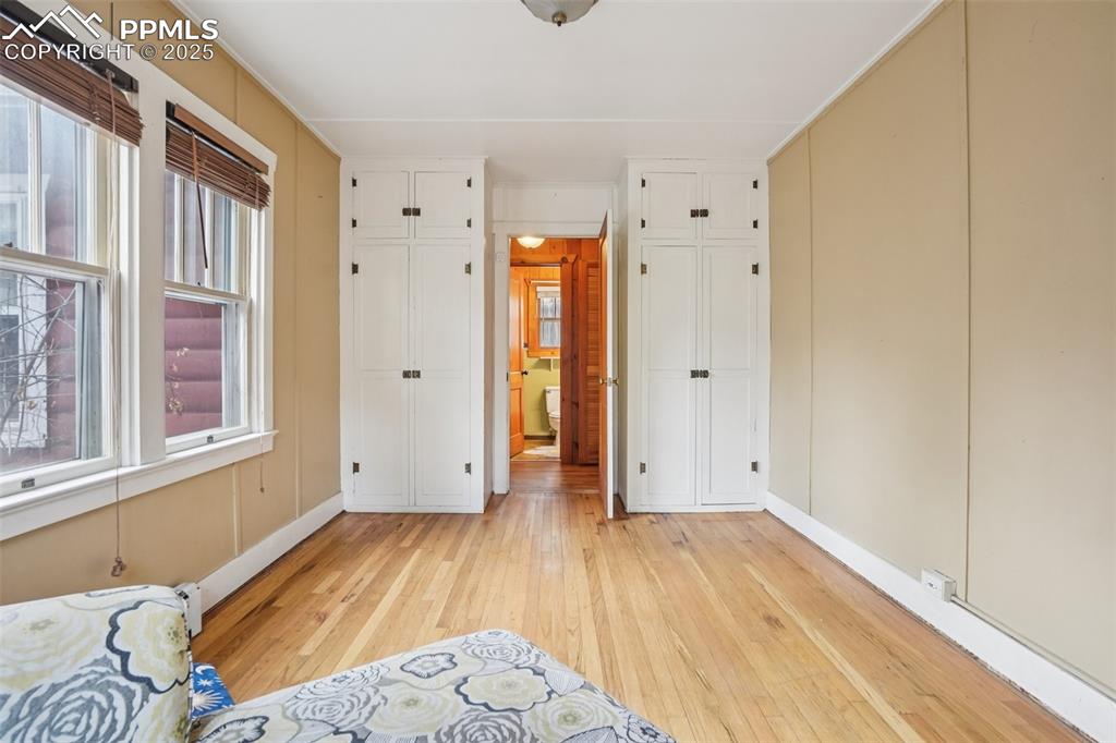 Bedroom 2 off living room bringing you to the primary bedroom