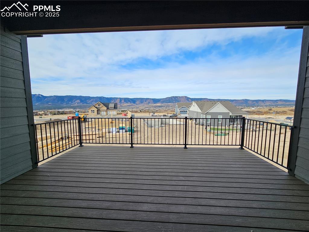 Wooden deck featuring a mountain view