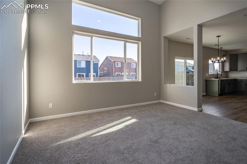 The living room is open to the kitchen and dining area.
