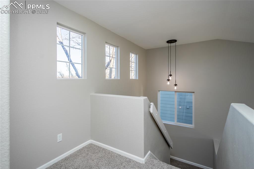 The upstairs landing is even filled with light.