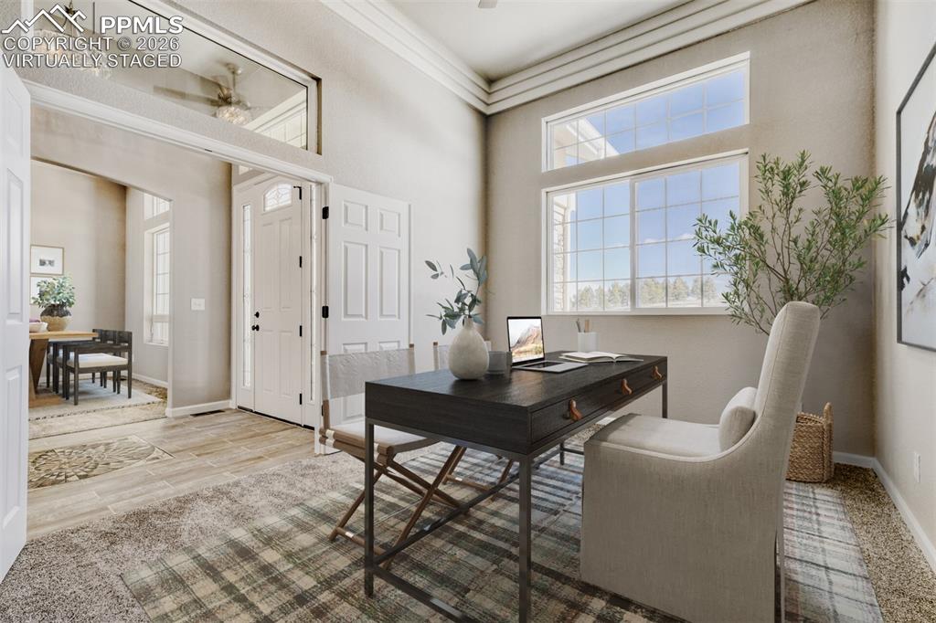 Virtually staged Secondary Bedroom #1 or Office off the front door with full bath.