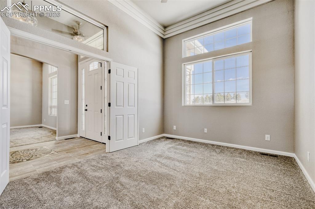 Secondary Bedroom #1 or Office off the front door with full bath.