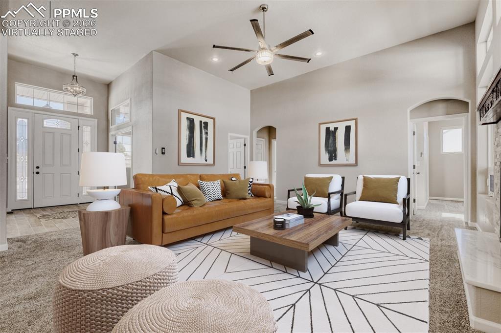Virtually staged Living Room with open concept and covered deck.