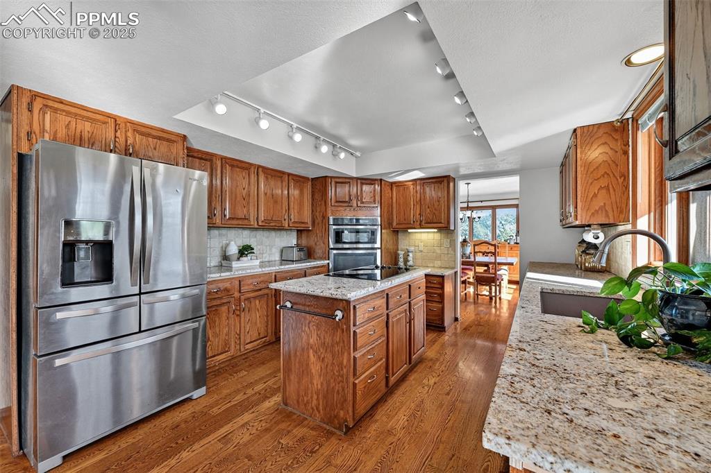 Granite counters, center island and upgraded appliances!