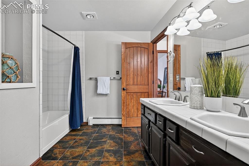 Large basement bath with two more sinks and extra counter space!