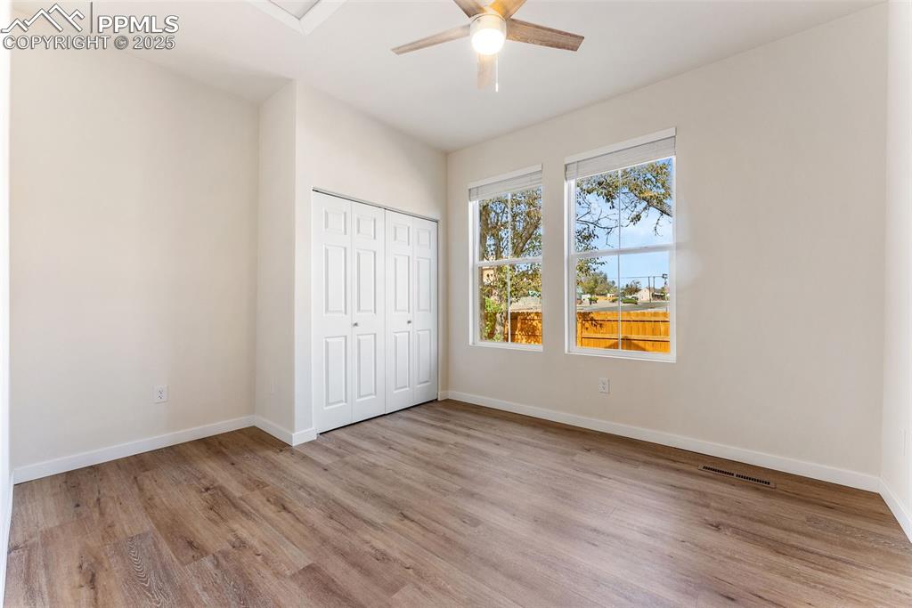 The primary bedroom is a good size and each bedroom comes with ceiling fans