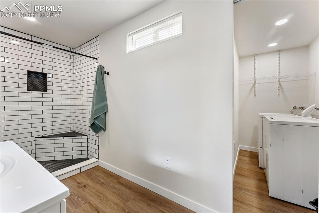 Off the bathroom is the laundry with included washer and dryer