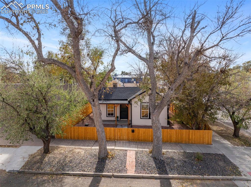 Corner lot with many mature trees