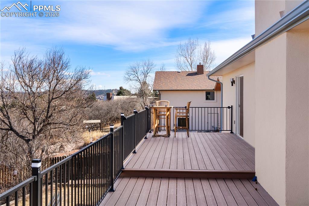 NEW back deck overlooks the back yard and boasts stunning views. 