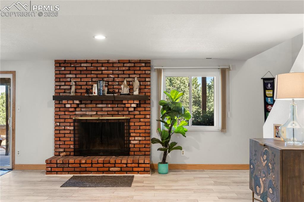 Wood burning fireplace in the basement. 