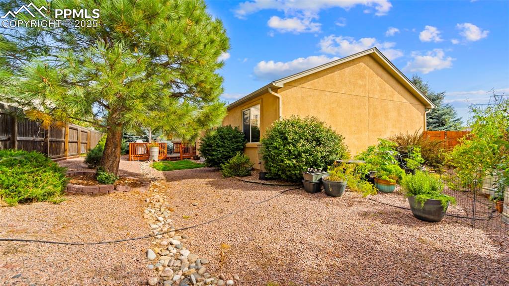 View of fenced backyard