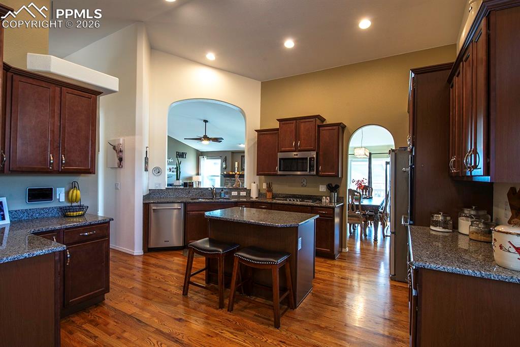 Kitchen with opening to see living room