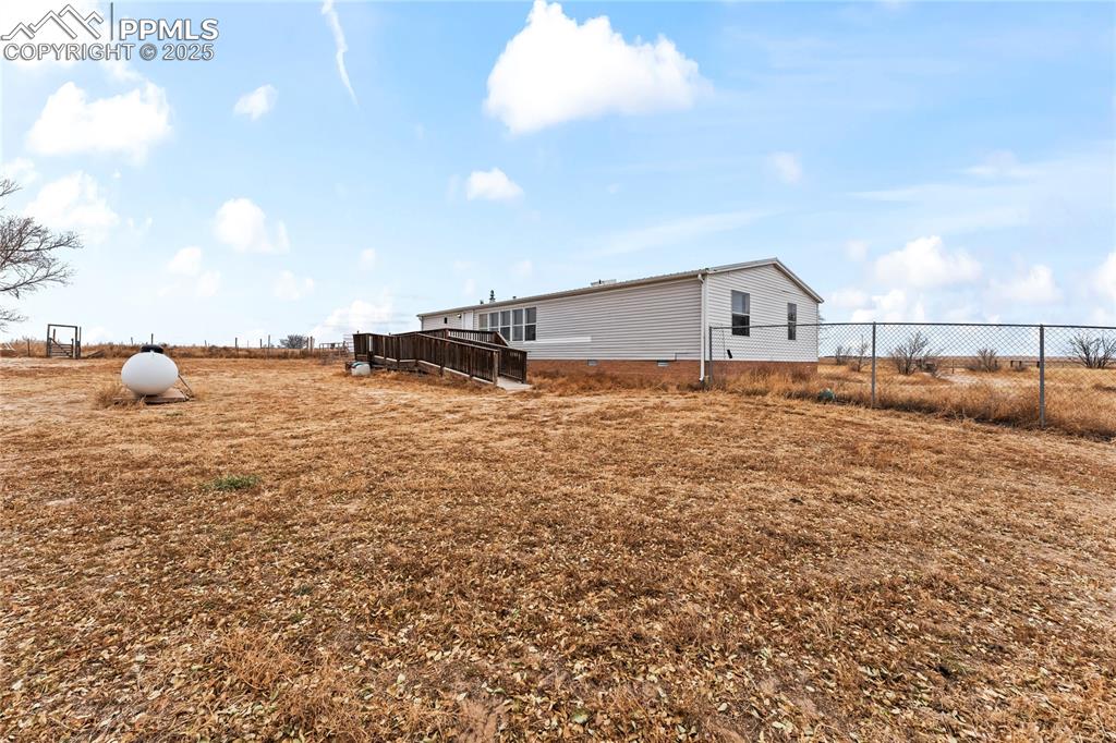 View of yard with a view of rural / pastoral area