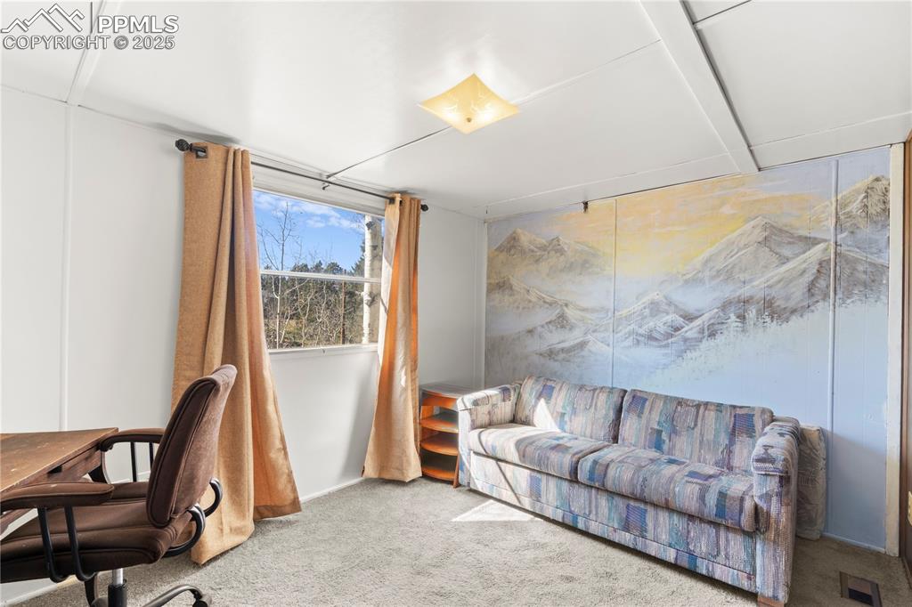 View of carpeted home office