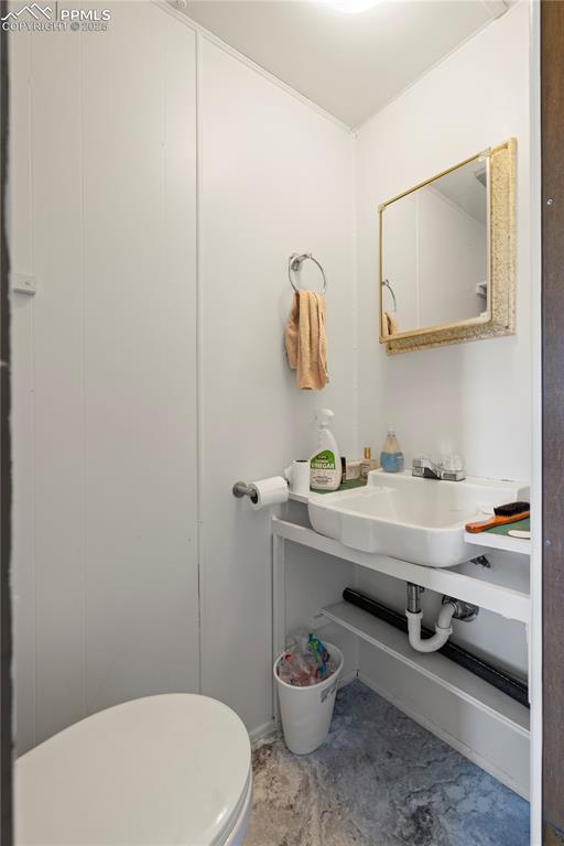 Bathroom with toilet and a sink