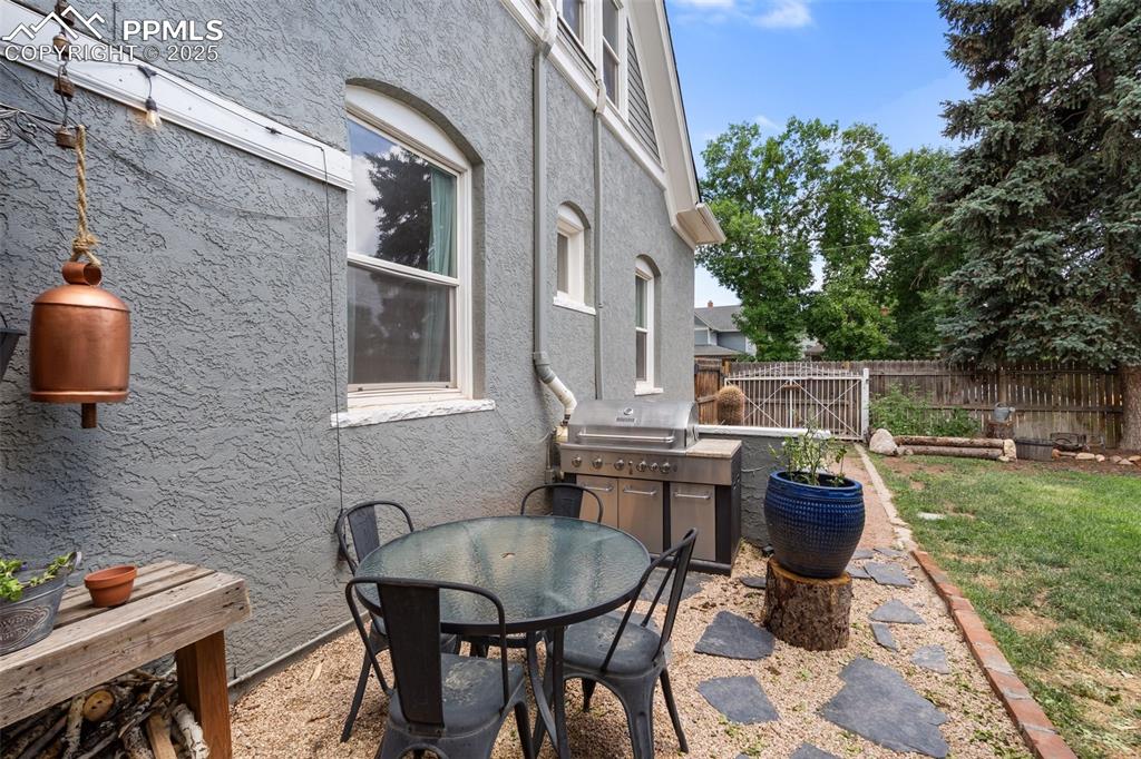 View of patio featuring outdoor dining area and exterior kitchen