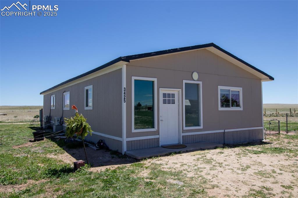 3425 Wiesner - View of front facade with cooling unit