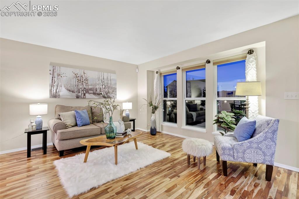 Living area featuring light wood-type flooring