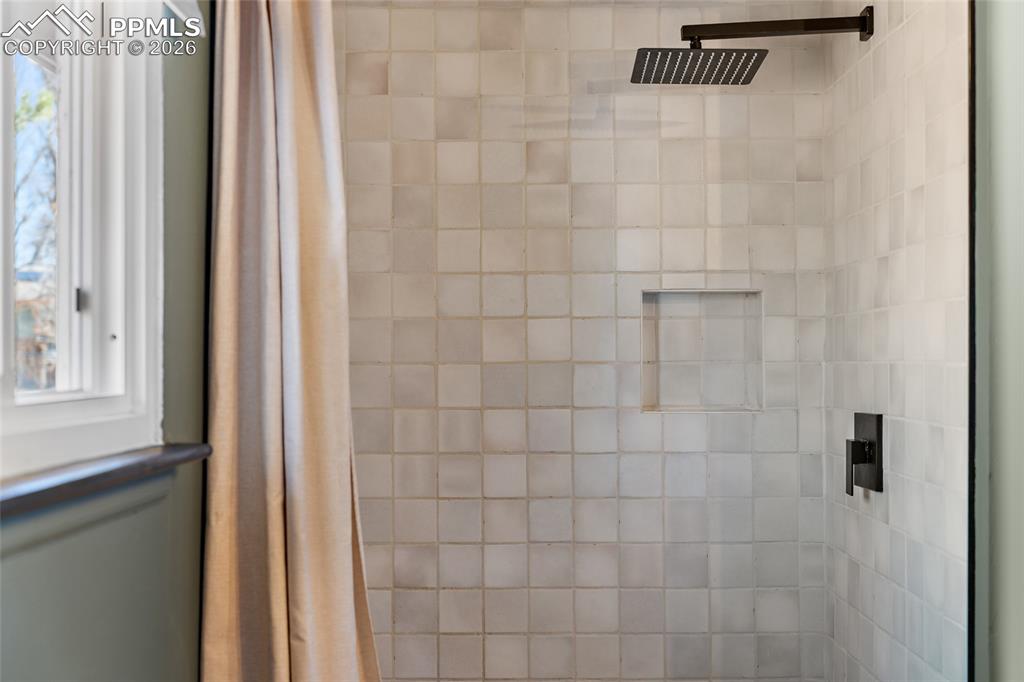 Bathroom view of a stall shower