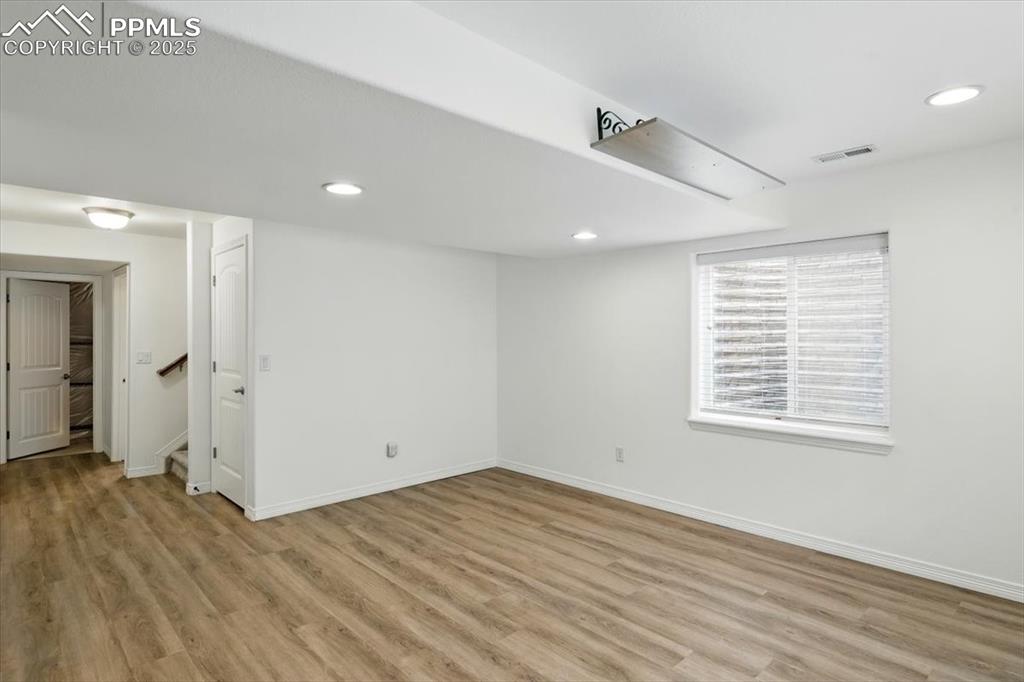 Office or dining space featuring wood finished floors and baseboards