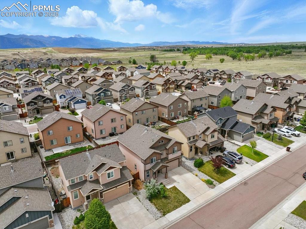 Aerial perspective of suburban area with mountains