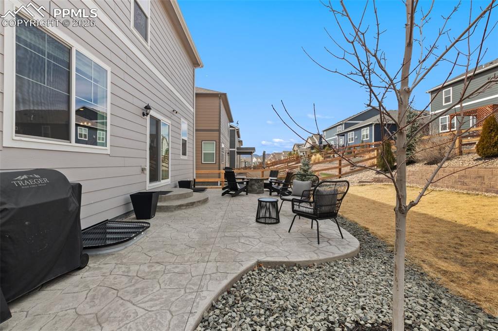 Custom landscaping and large stamped concrete patio