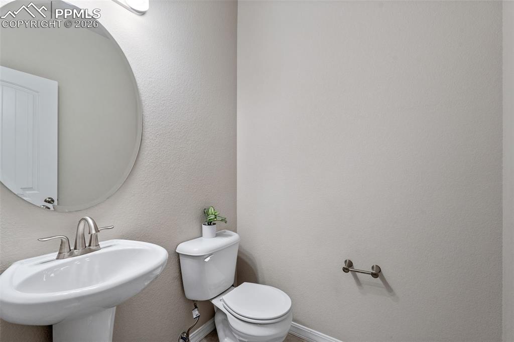 Bathroom featuring toilet and a sink