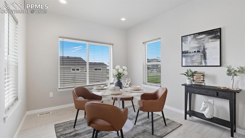 Sunny Dining Area located off the Kitchen for convenient food service, entertaining, and clean up.