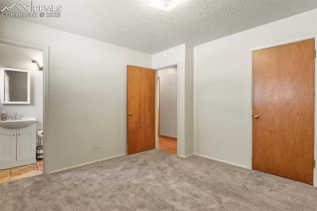  Primary bedroom and ensuite bath
