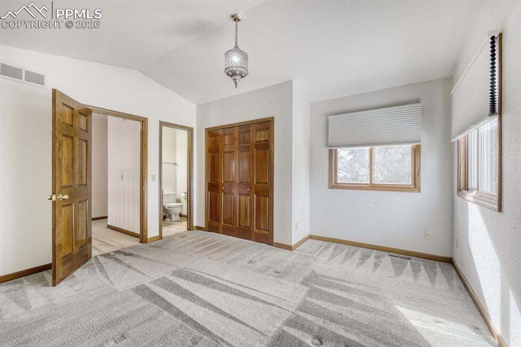 secondary bedroom with ensuite bath 