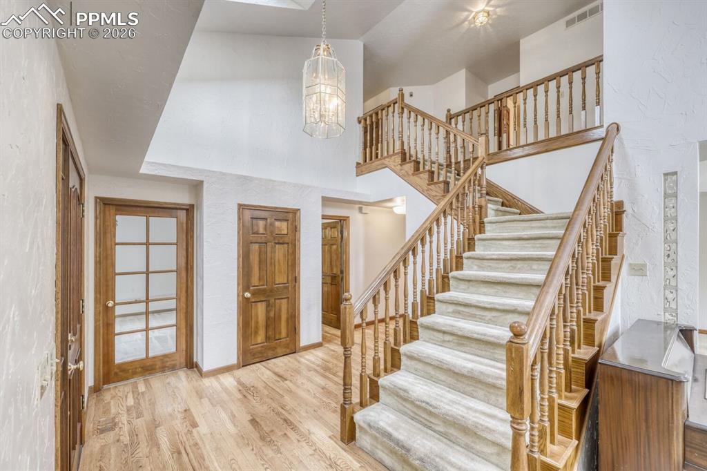 Beautiful entry with hardwoods and coat closet.  