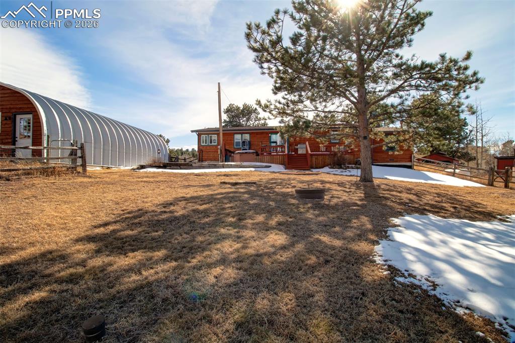 Back of home with garage to the left