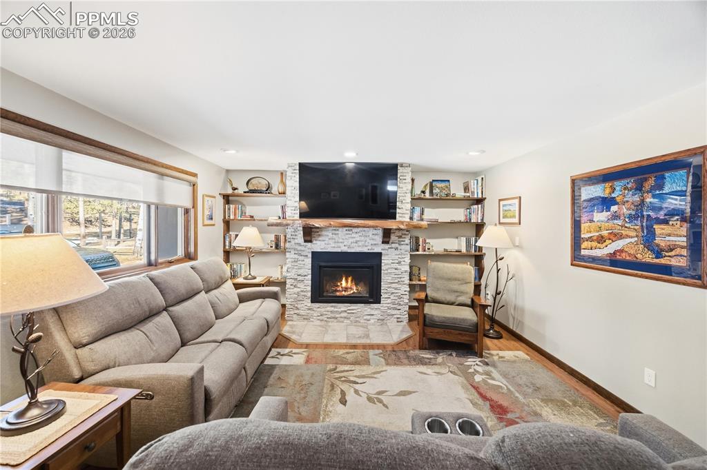 custom made black walnut mantel and built-in shelving