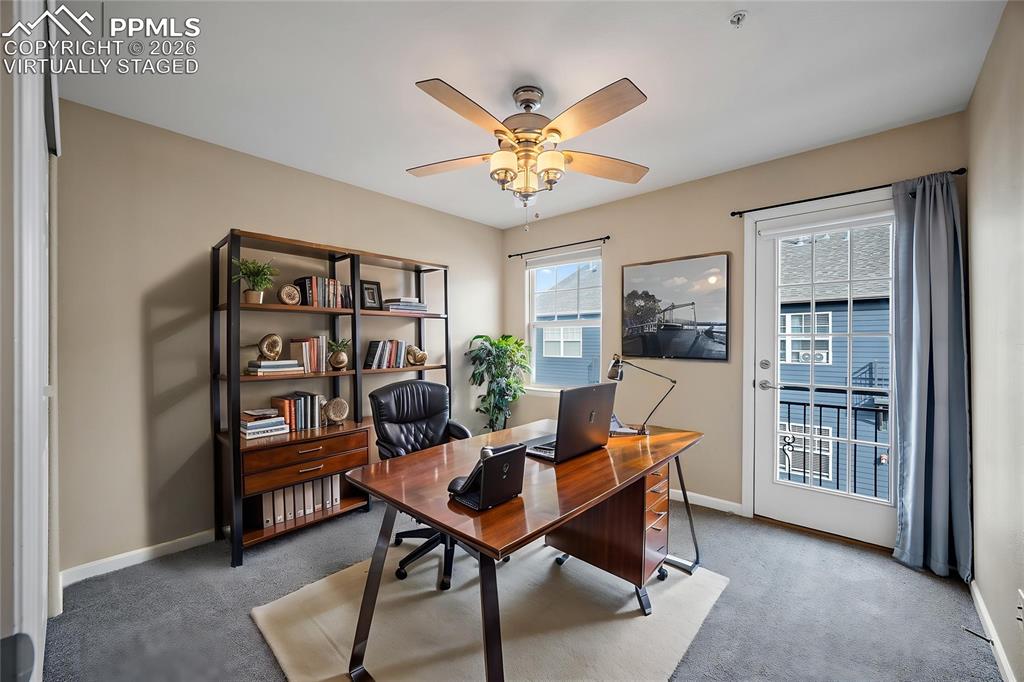 virtually staged - One of the bedrooms being staged as an office. 