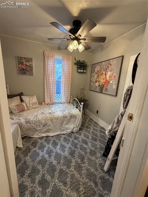 Bedroom with carpet floors and ceiling fan