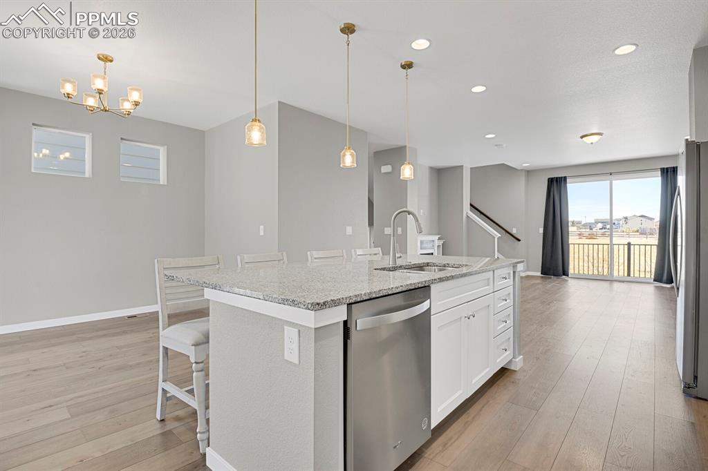 Kitchen looking into the dining area and living room 