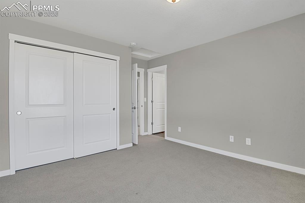 Second bedroom on upper level with ensuite bathroom 