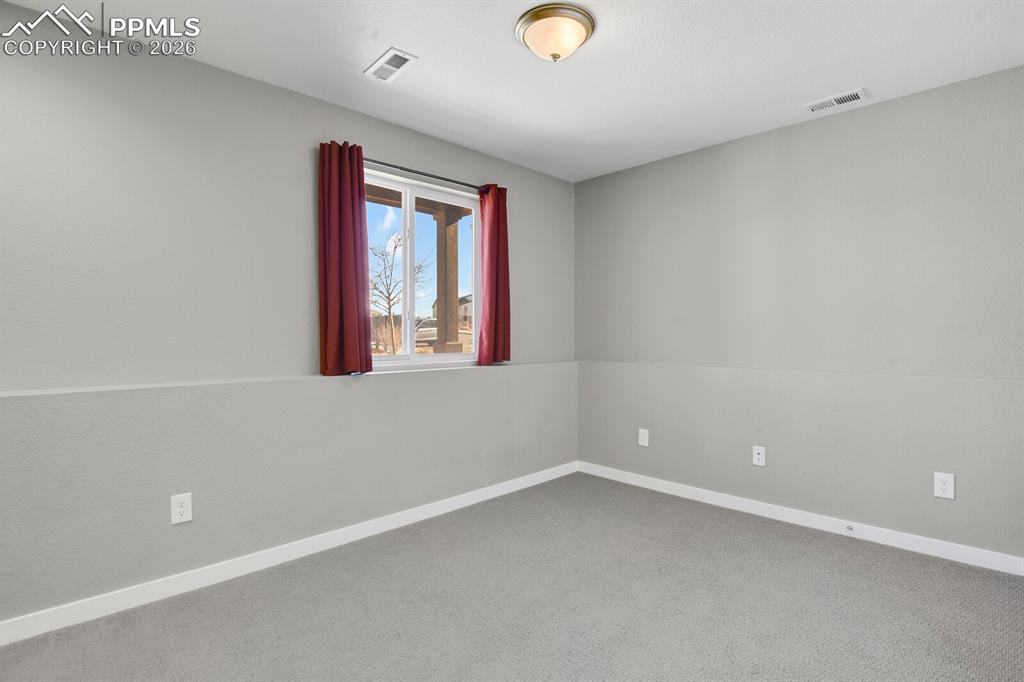 Flex space that can be used as a 3rd bedroom , office or exercise area.